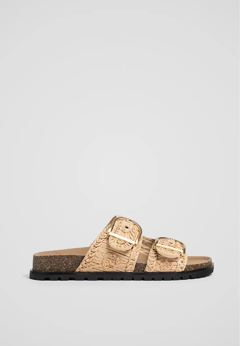 Flache Sandalen im rustikalen Stil für 39,99€ in Stradivarius