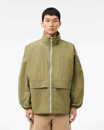 Wasserabweisende Windjacke mit abnehmbarer Kapuze für 250€ in Lacoste